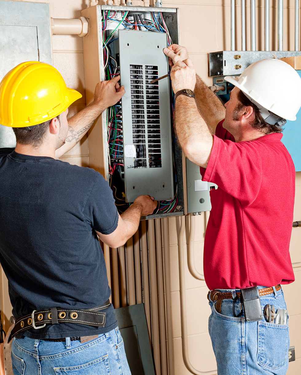 Electrician Installs a Generac generator at CGA Electric